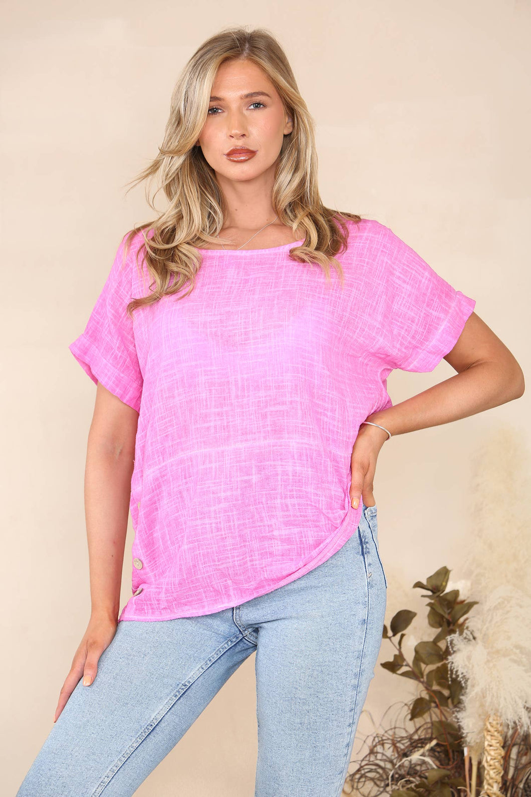 Summer top with decorative buttons pink